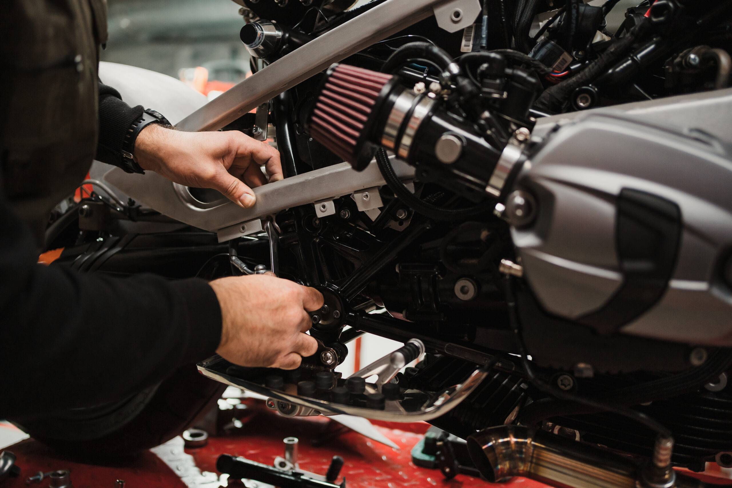 Man fixing a motorcycle